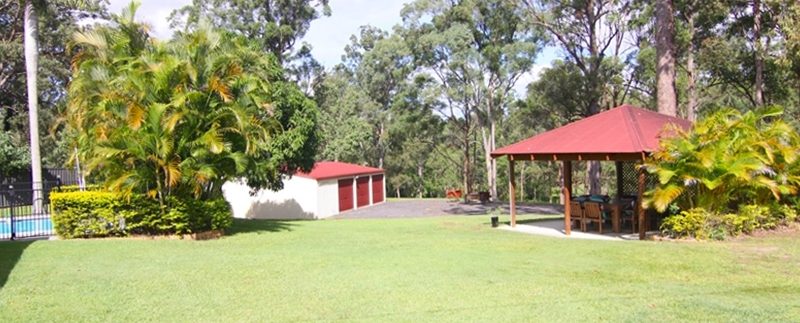 yard toward gazebo, shed and pool